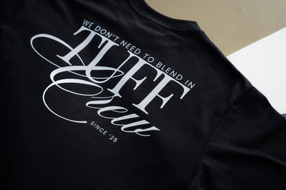 "We Don't Need To Blend In" Black Tee